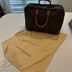 Louis Vuitton Monogram Canvas carry-On. (Comes W/tag, lock & key; canvas bag)